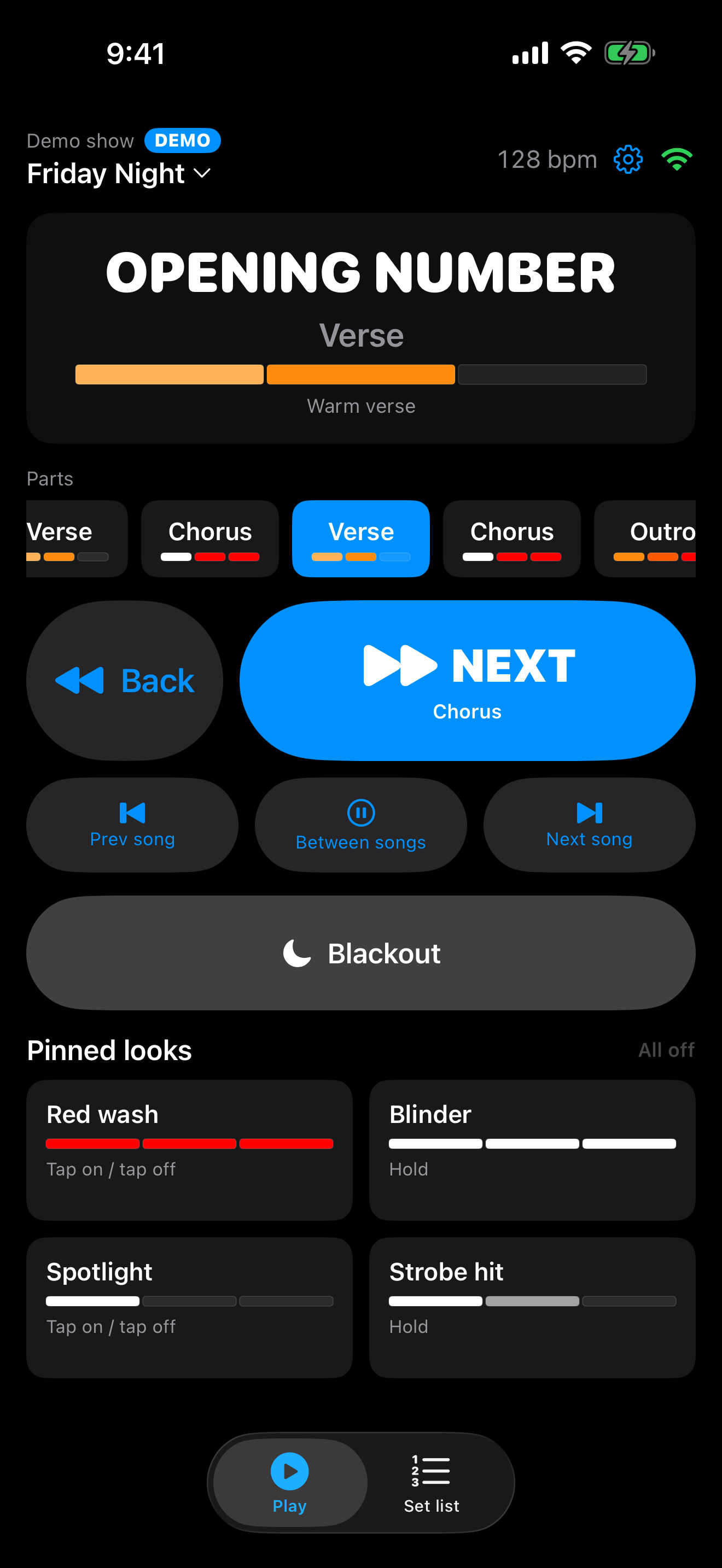 BANDMX Remote on iPhone showing the current song and part, a large Next button, Blackout, and four pads.